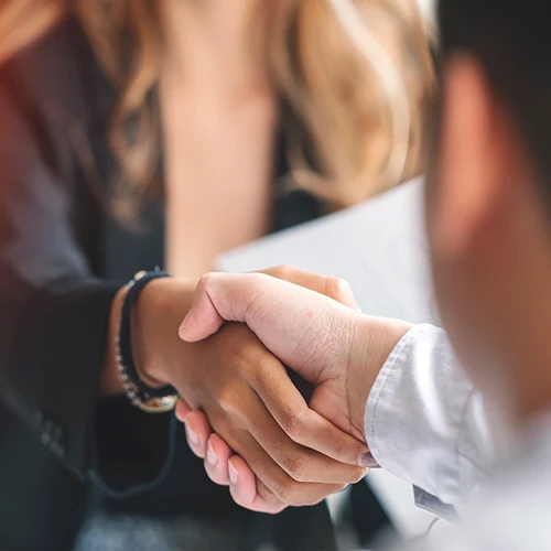 Dental Wheeling IL Doctor and Client Shaking Hands Dental Wheeling IL Doctor and Client Shaking Hands